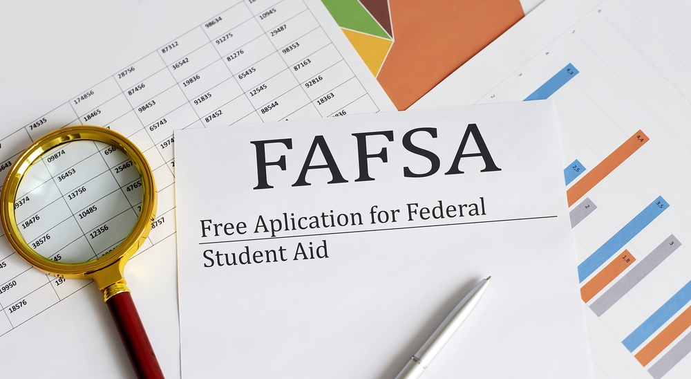 Paper with FAFSA Free Application for Federal Student Aid on top